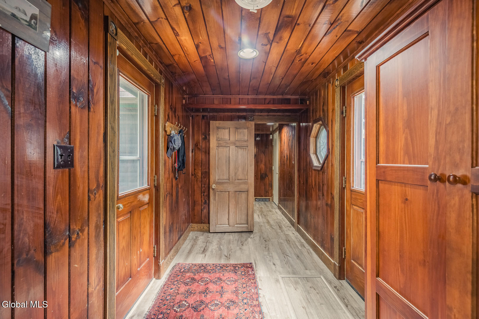 1532 South Shore Road Edinburg, NY 12835 - Photo 21 of 30 Hallway to Primary Bedroom