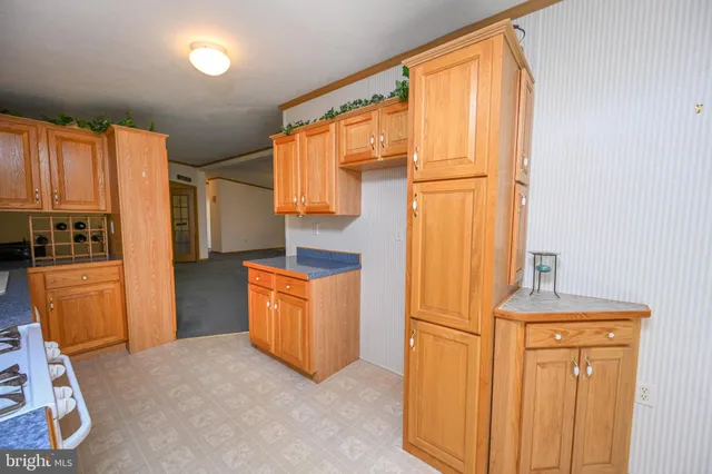 a bed room with a bed and a dresser