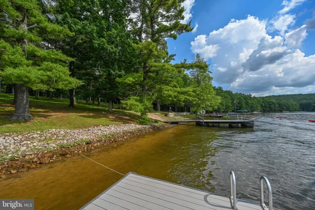 a view of staircase with wooden floor