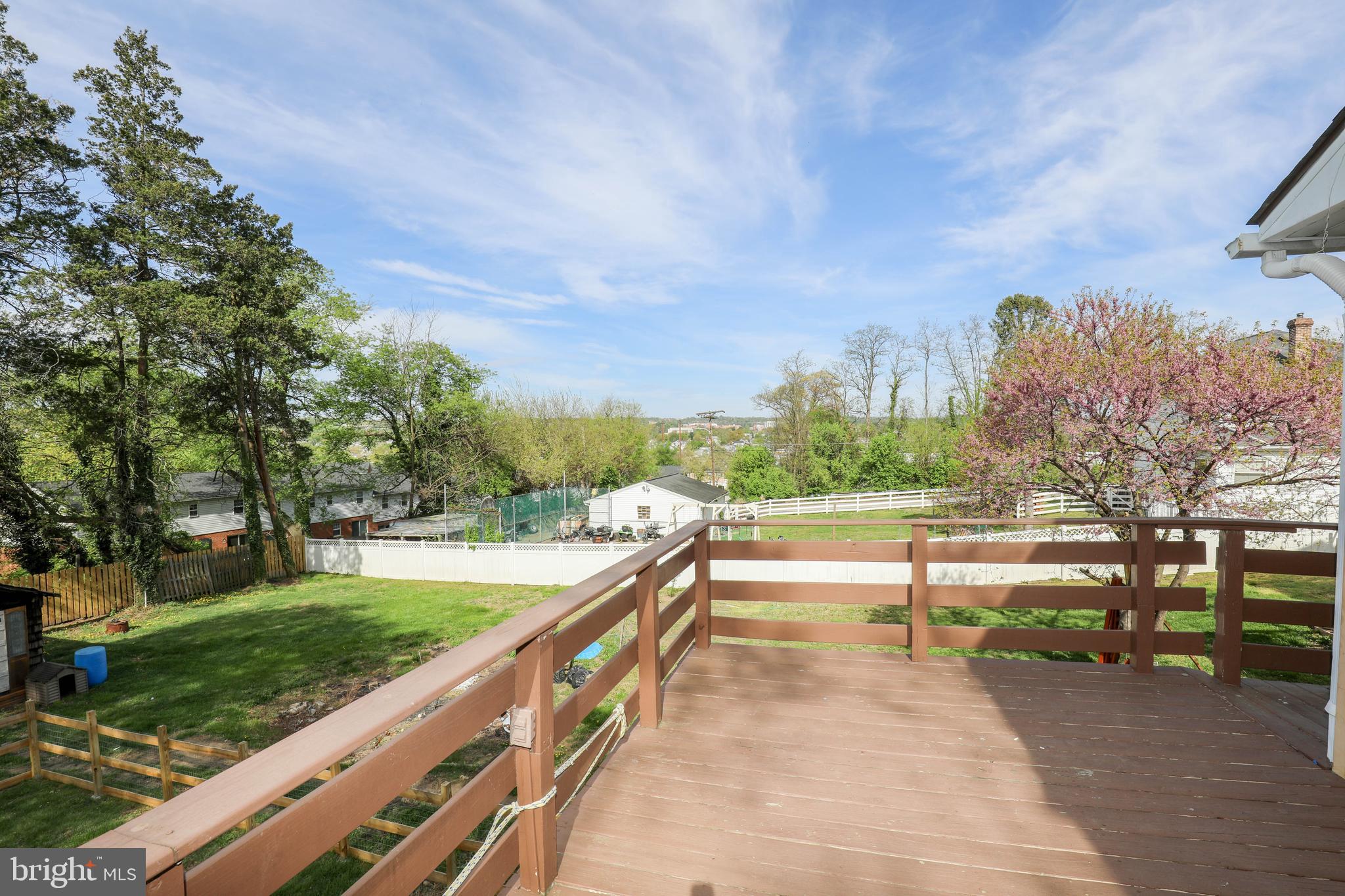 103 R Waelchli Avenue Halethorpe, MD 21227 - Photo 25 of 37 a view of a pathway with a wrought fence
