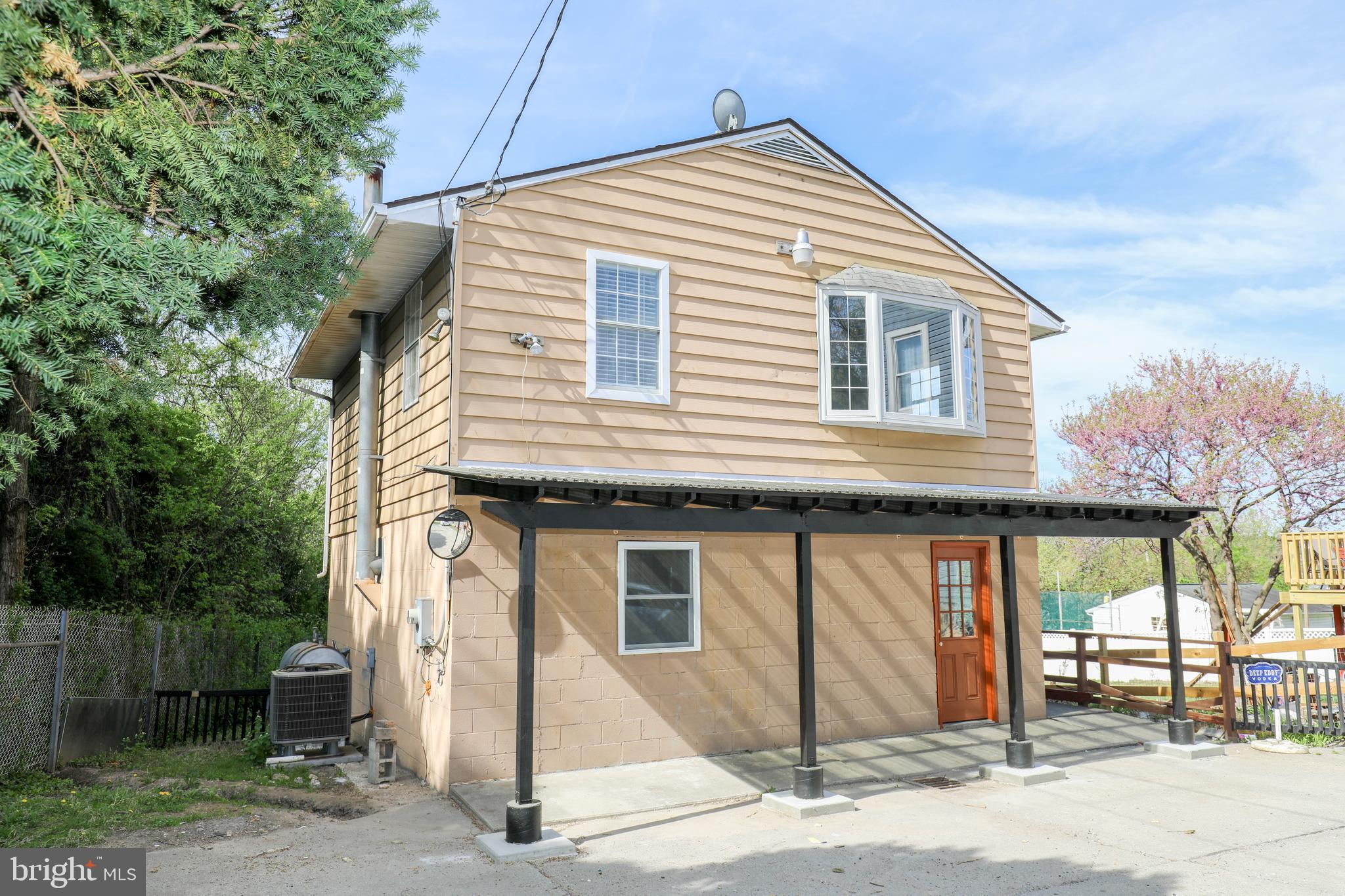 103 R Waelchli Avenue Halethorpe, MD 21227 - Photo 35 of 37 a front view of a house