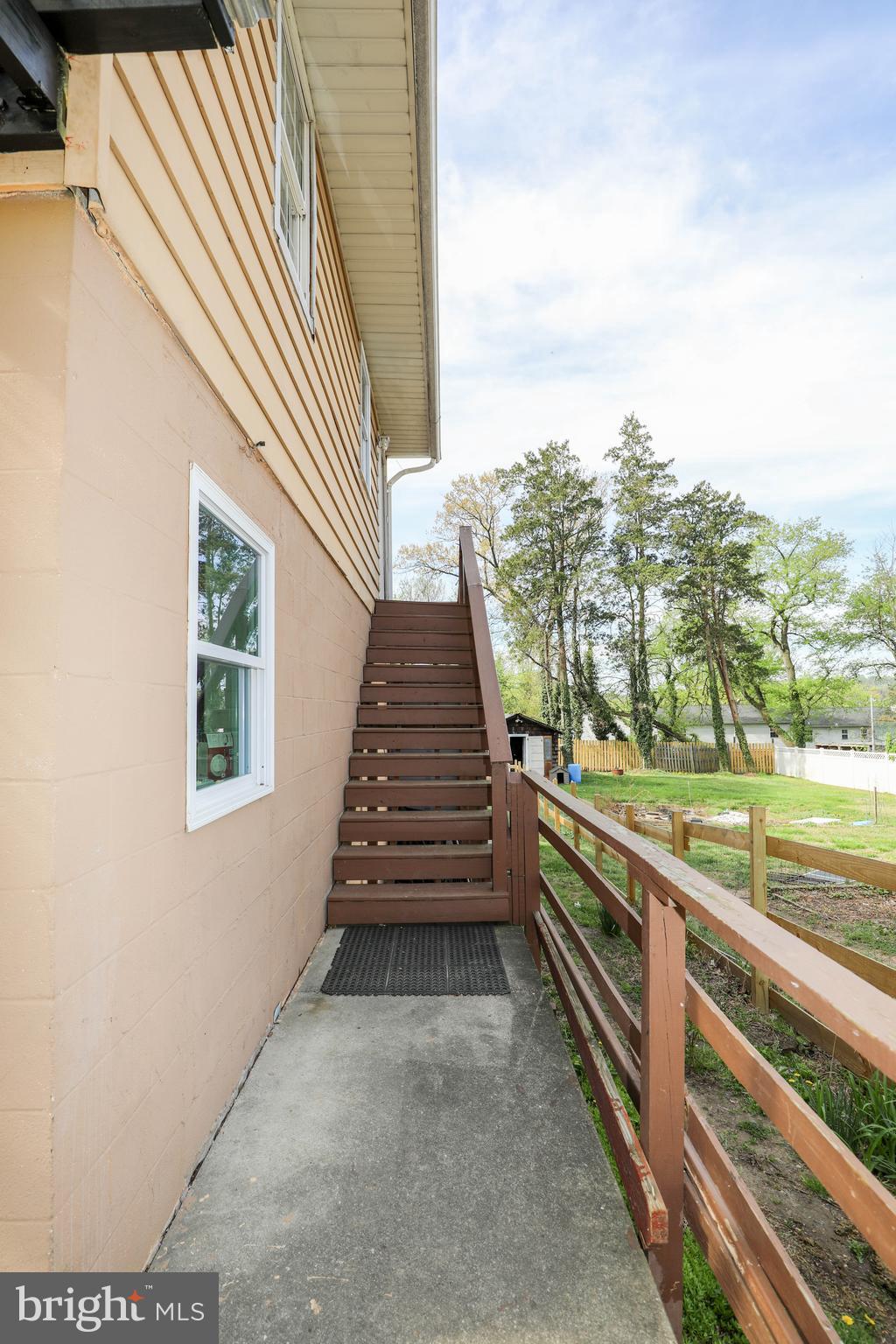 103 R Waelchli Avenue Halethorpe, MD 21227 - Photo 5 of 37 a view of a backyard with sitting area