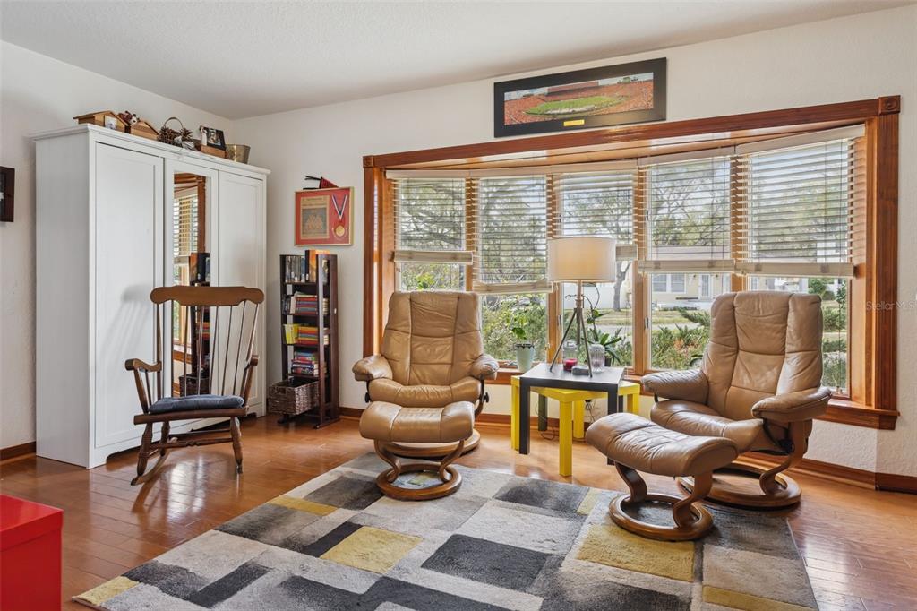 2603 North Ridgewood Avenue Tampa, FL 33602 - Photo 18 of 44 a living room with furniture and floor to ceiling window