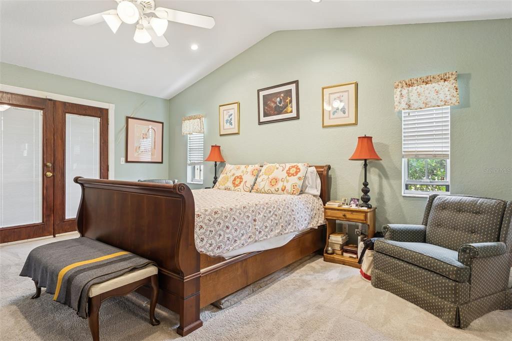 2603 North Ridgewood Avenue Tampa, FL 33602 - Photo 19 of 44 a bedroom with a bed couch and window