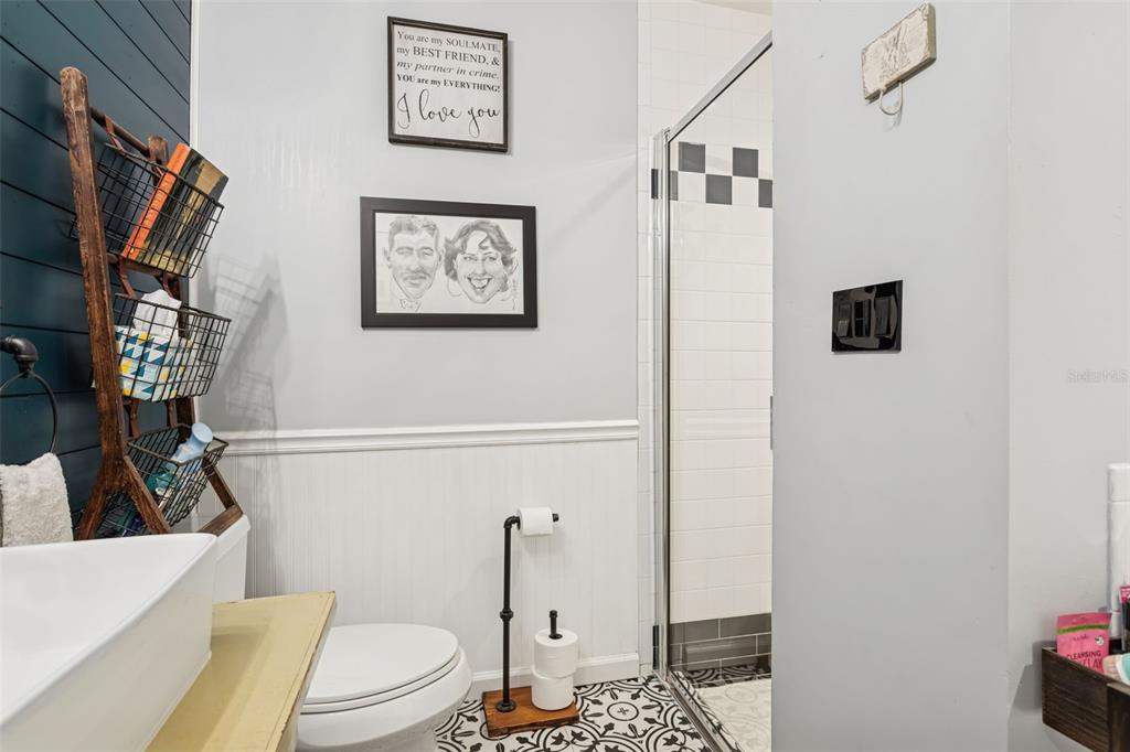 2603 North Ridgewood Avenue Tampa, FL 33602 - Photo 22 of 44 a bathroom with a toilet and a shower
