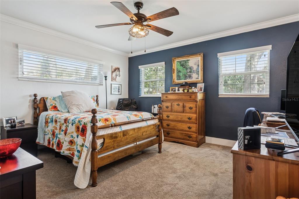 2603 North Ridgewood Avenue Tampa, FL 33602 - Photo 24 of 44 a bedroom with a bed and a dresser
