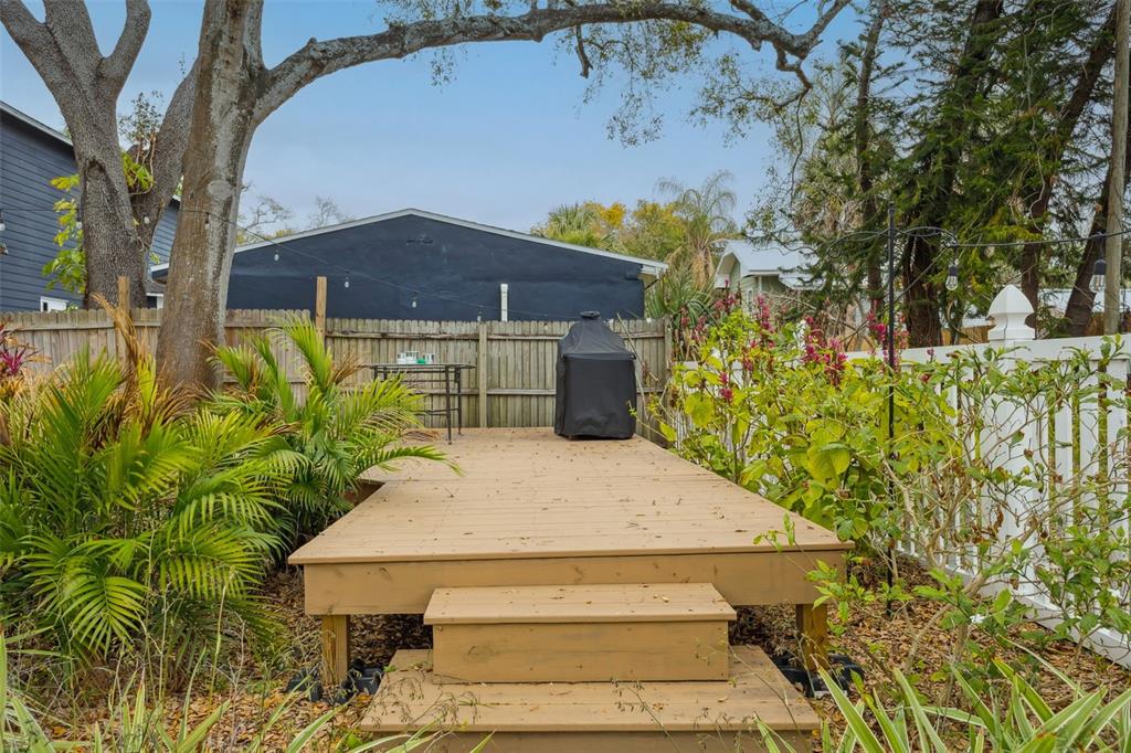 2603 North Ridgewood Avenue Tampa, FL 33602 - Photo 7 of 44 a front view of a house with a yard