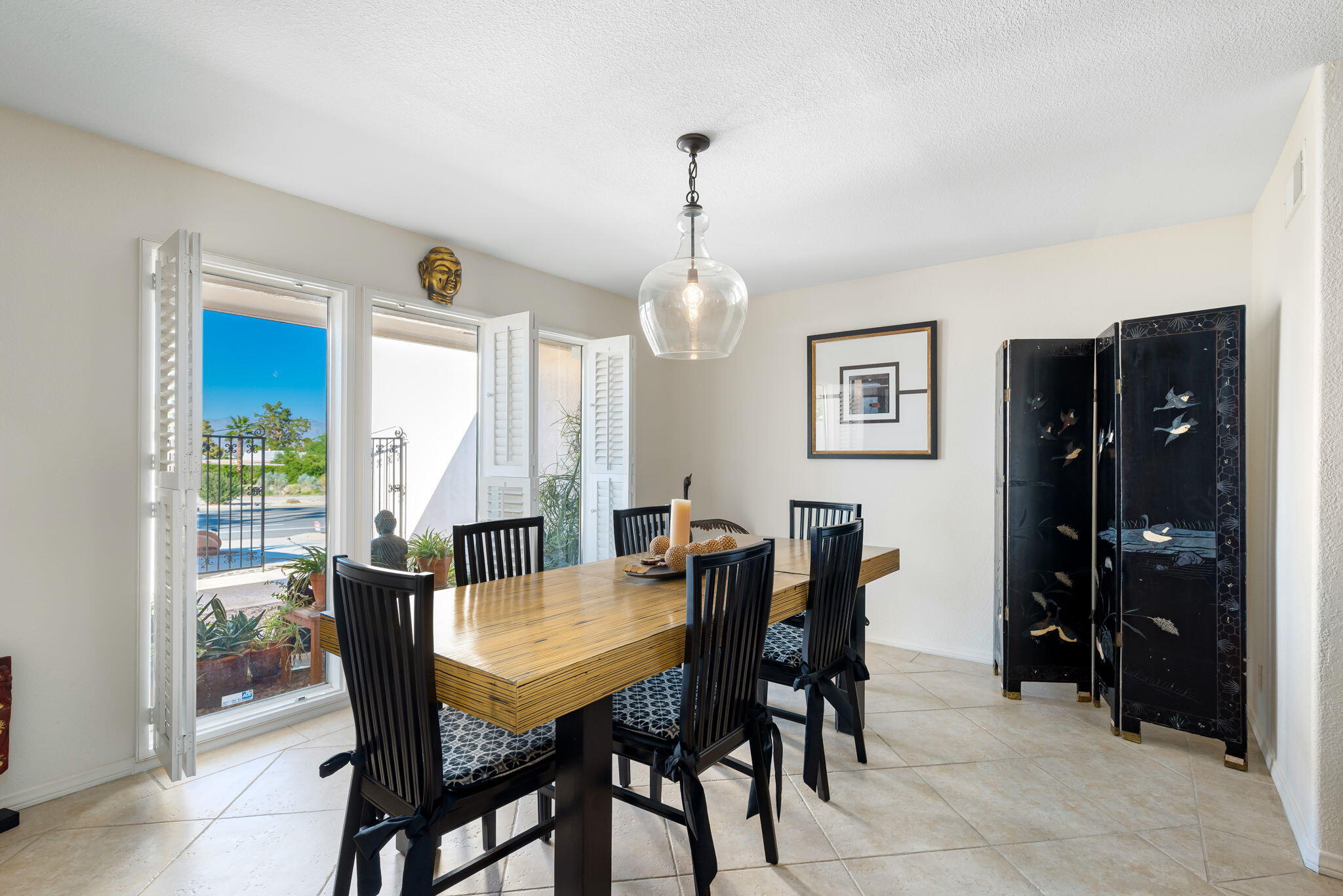 73535 Haystack Road Palm Desert, CA 92260 - Photo 22 of 47 a view of a dining room with furniture and window