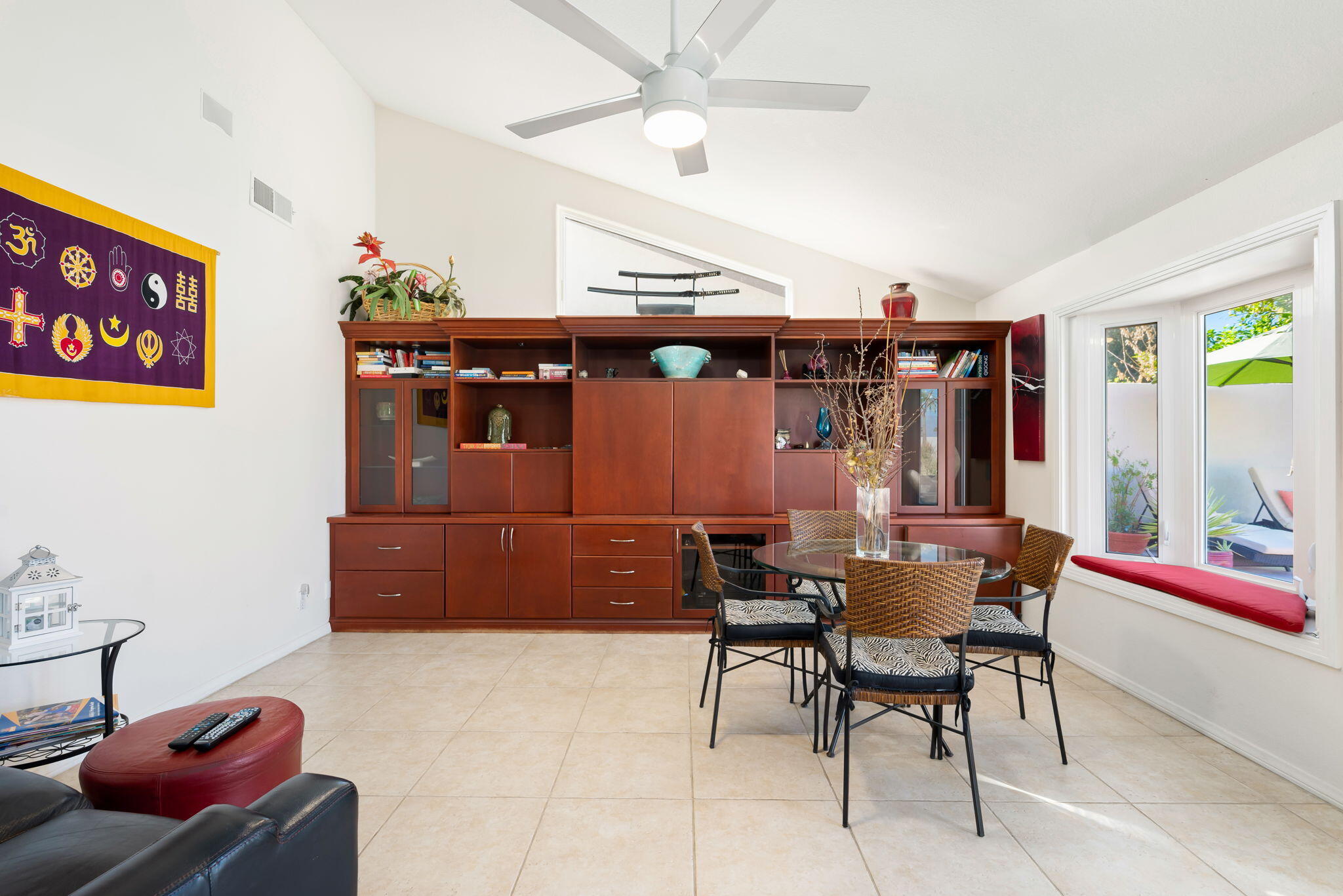 73535 Haystack Road Palm Desert, CA 92260 - Photo 24 of 47 a view of a dining room with furniture and chandelier