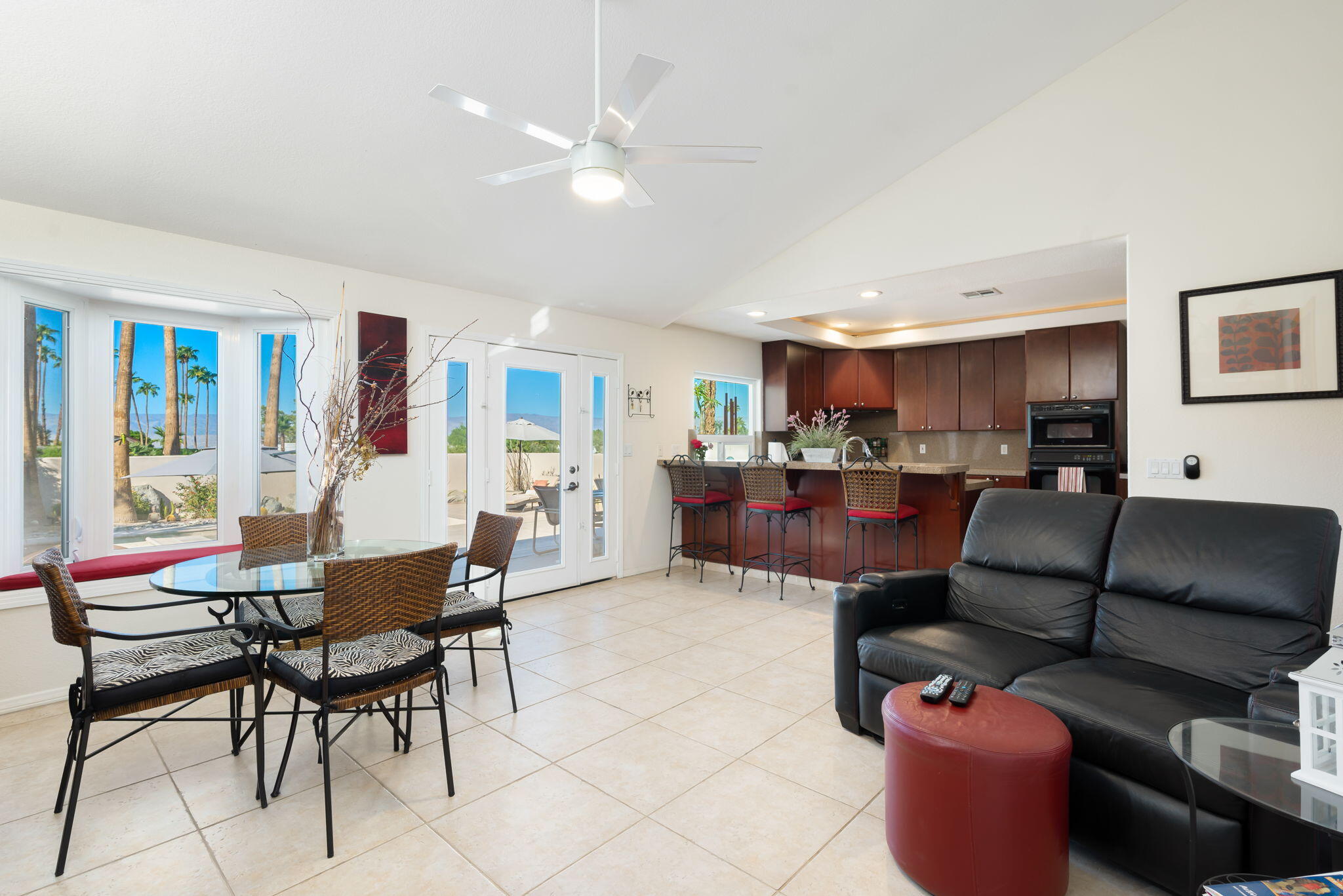 73535 Haystack Road Palm Desert, CA 92260 - Photo 27 of 47 a living room with furniture and a large window