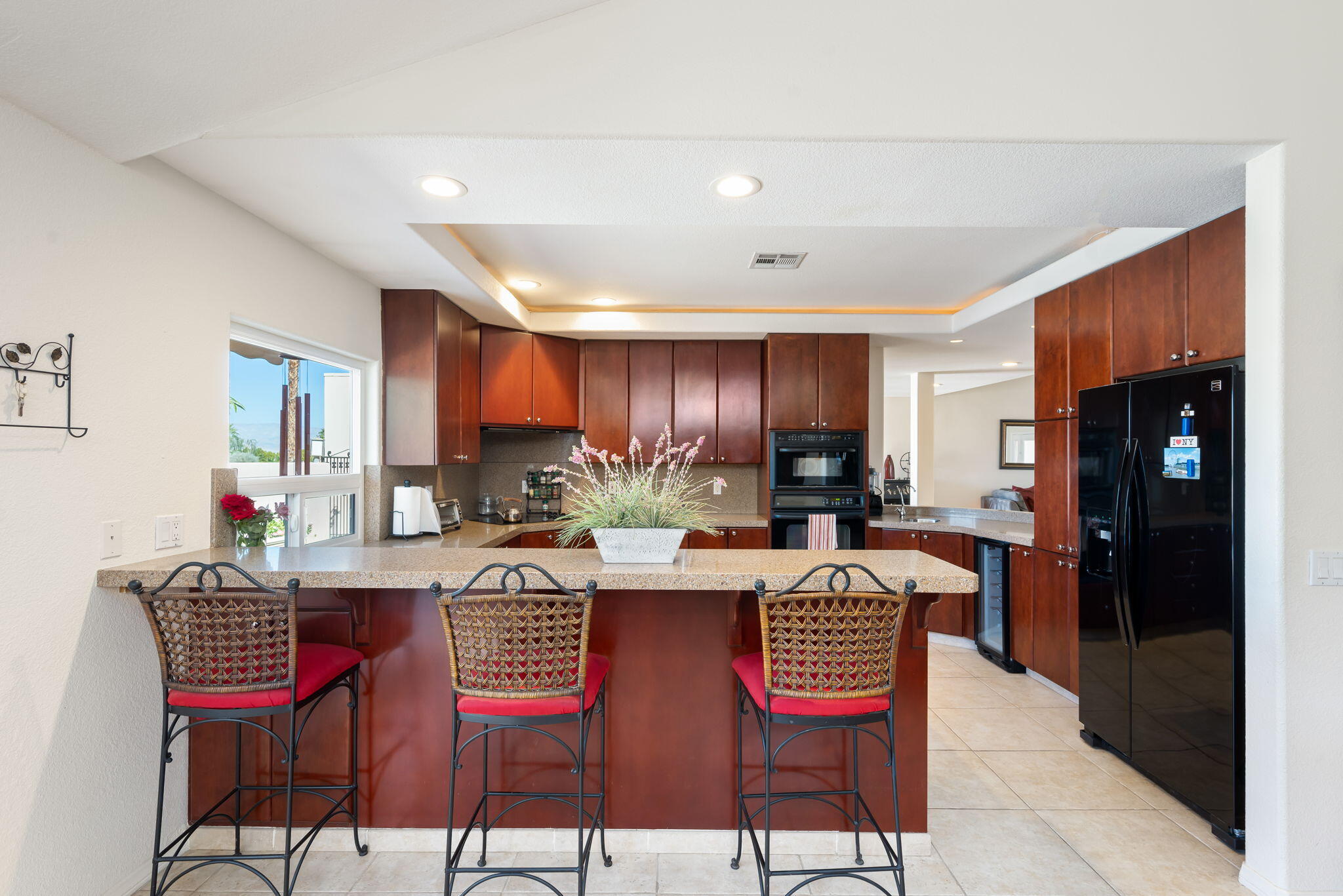 73535 Haystack Road Palm Desert, CA 92260 - Photo 28 of 47 a view of a dining room with furniture