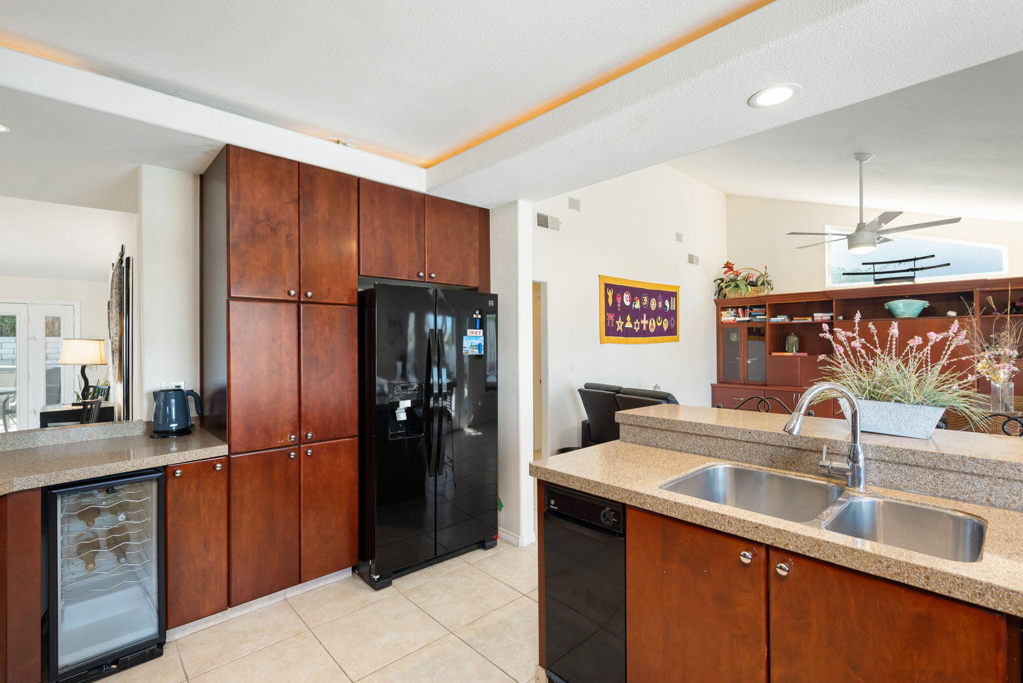73535 Haystack Road Palm Desert, CA 92260 - Photo 31 of 47 a kitchen with stainless steel appliances a sink and a refrigerator