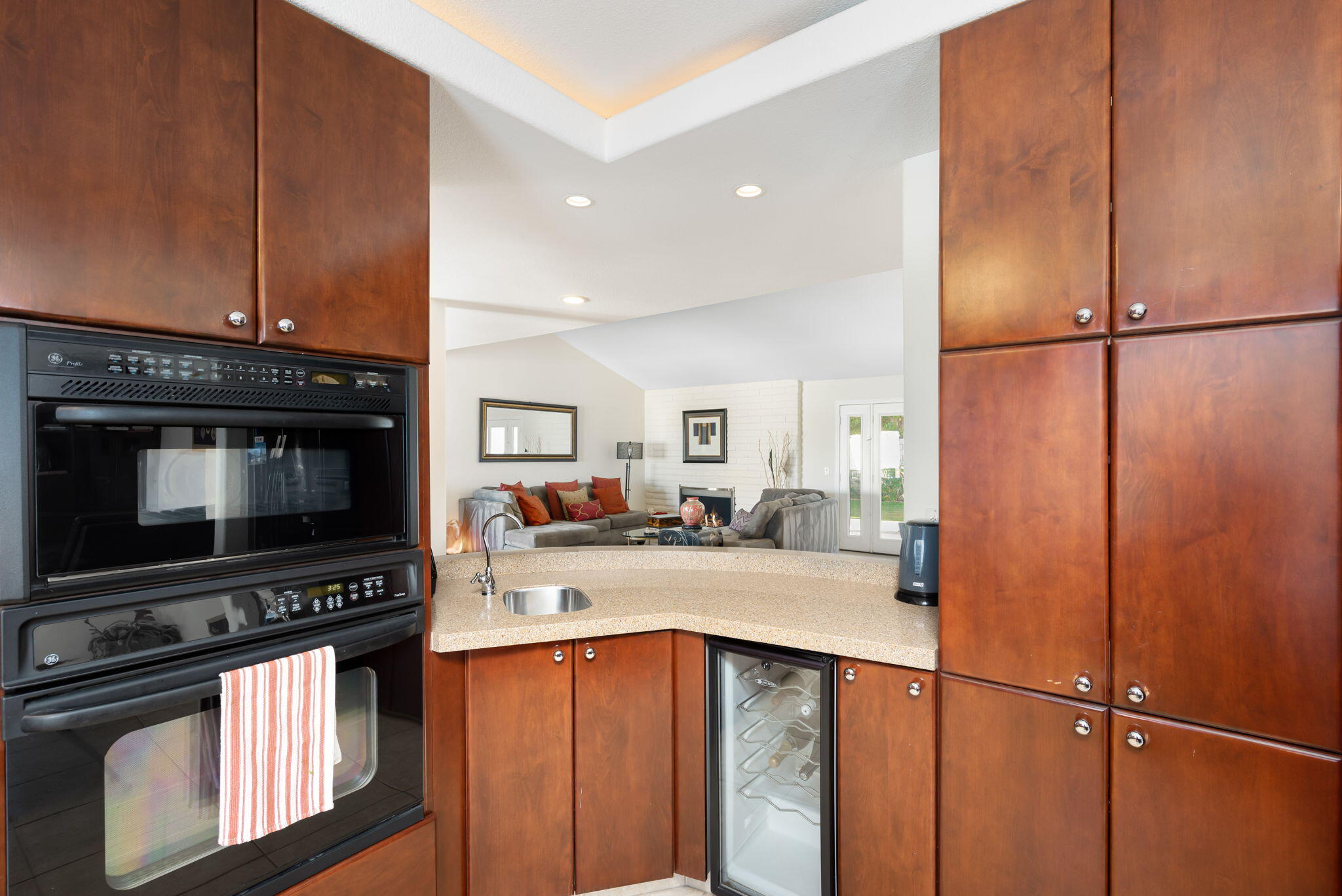 73535 Haystack Road Palm Desert, CA 92260 - Photo 32 of 47 a kitchen with stainless steel appliances granite countertop a refrigerator and a microwave