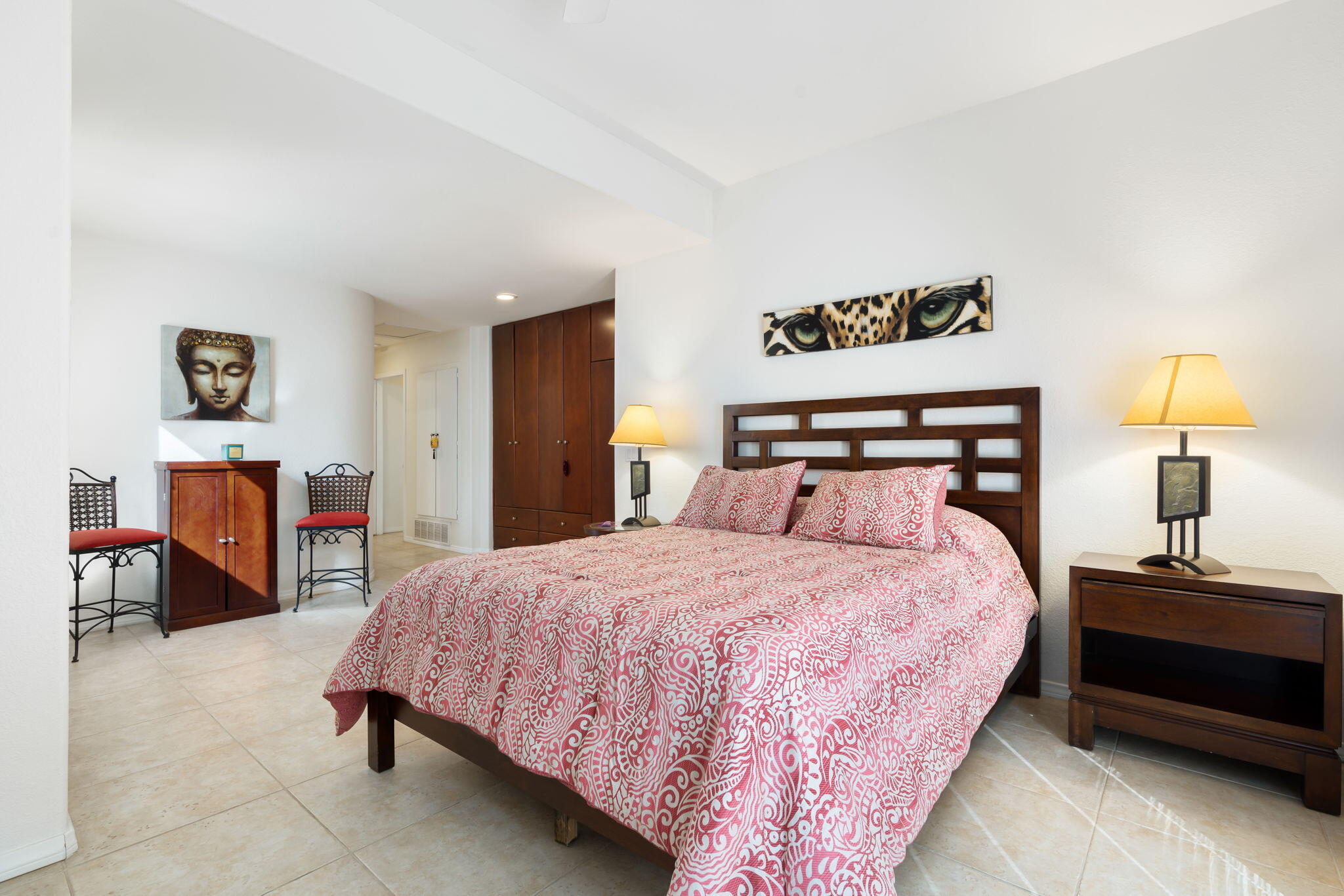 73535 Haystack Road Palm Desert, CA 92260 - Photo 39 of 47 a bedroom with a bed and a lamp