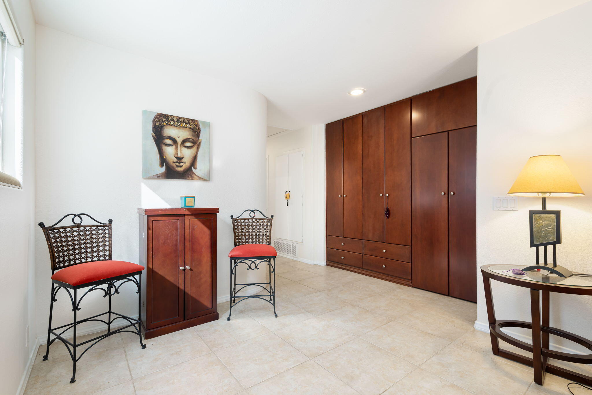 73535 Haystack Road Palm Desert, CA 92260 - Photo 40 of 47 a bedroom with furniture and a lamp