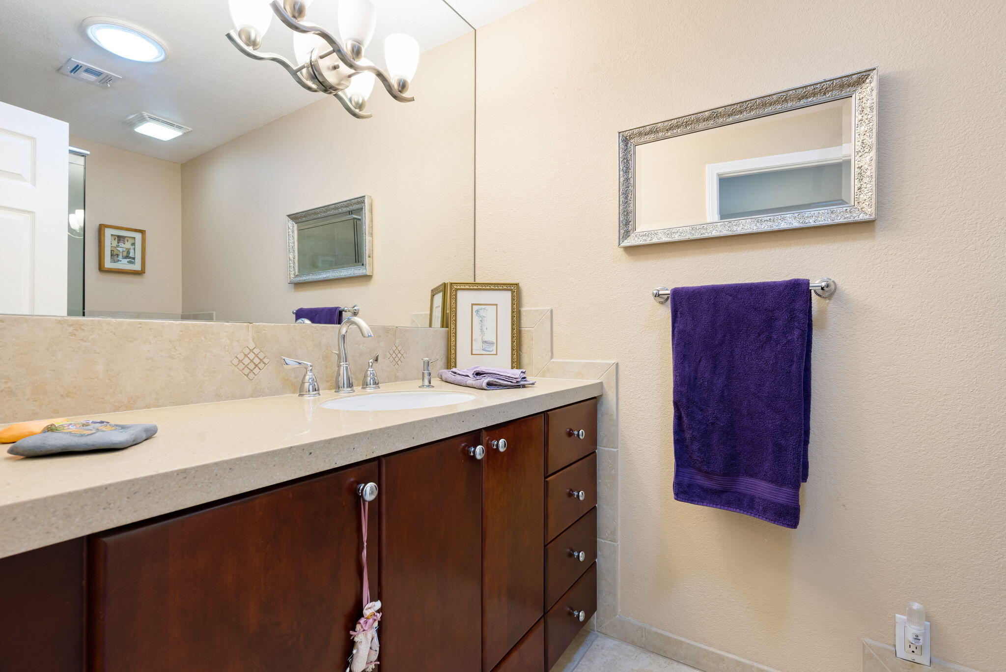 73535 Haystack Road Palm Desert, CA 92260 - Photo 44 of 47 a bathroom with a sink and a mirror