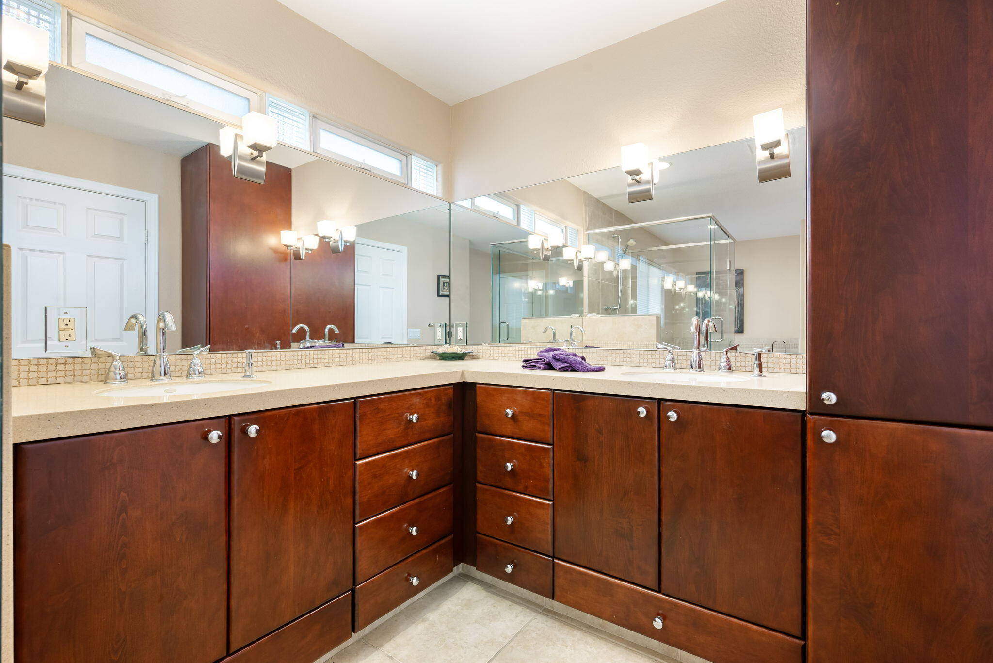 73535 Haystack Road Palm Desert, CA 92260 - Photo 46 of 47 a bathroom with a double vanity sink and a mirror