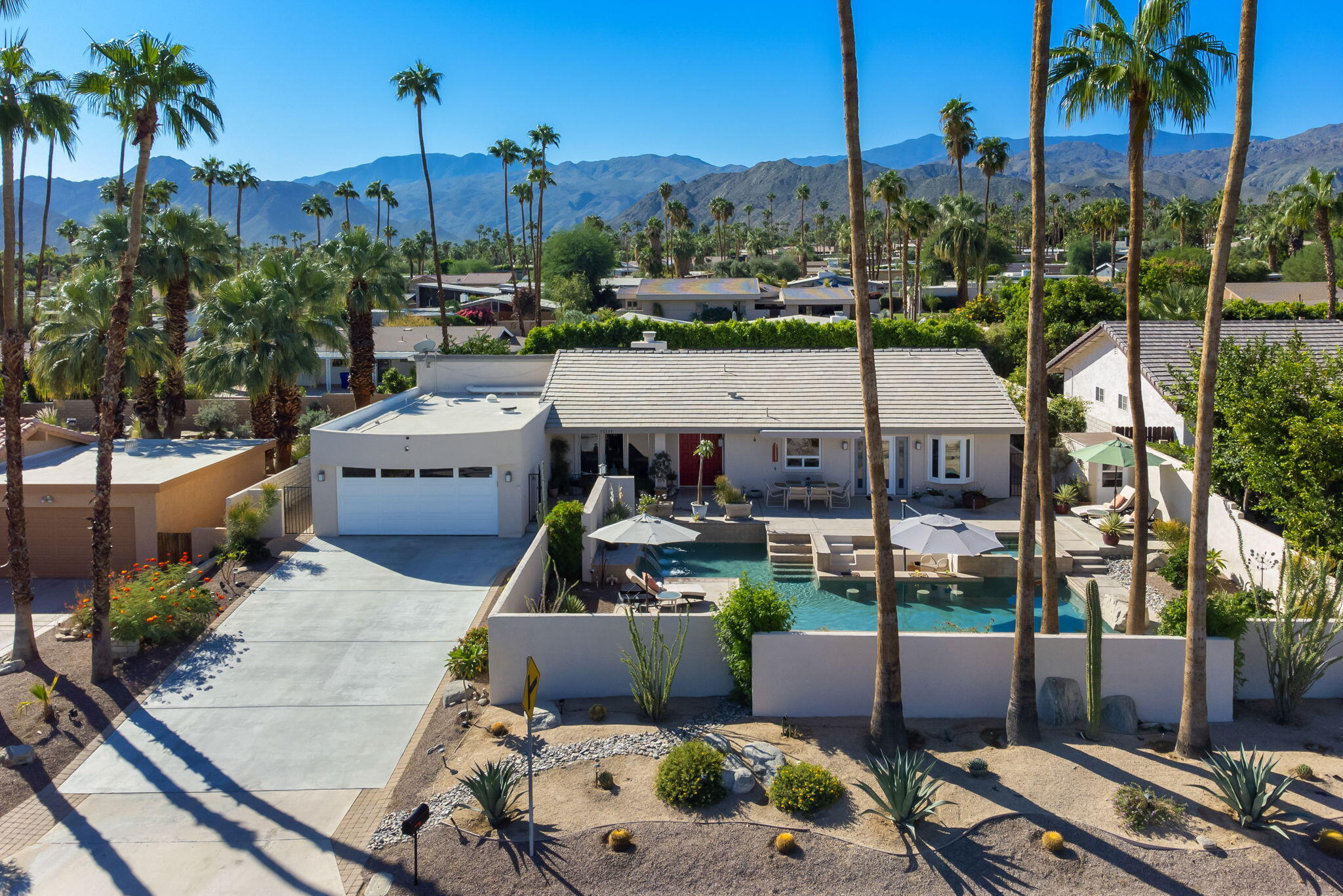 73535 Haystack Road Palm Desert, CA 92260 - Photo 6 of 47 a view of a terrace with furniture