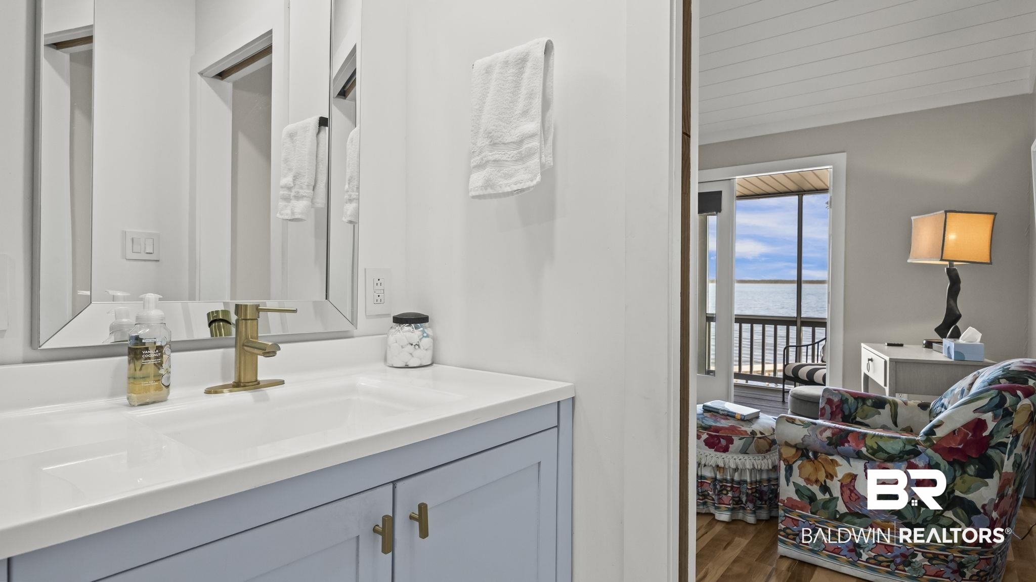 26063 Canal Road, Unit 2F Orange Beach, AL 36561 - Photo 21 of 36 Bathroom with a water view, vanity, and wood finished floors