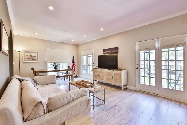 a front view of a house with yard and green space