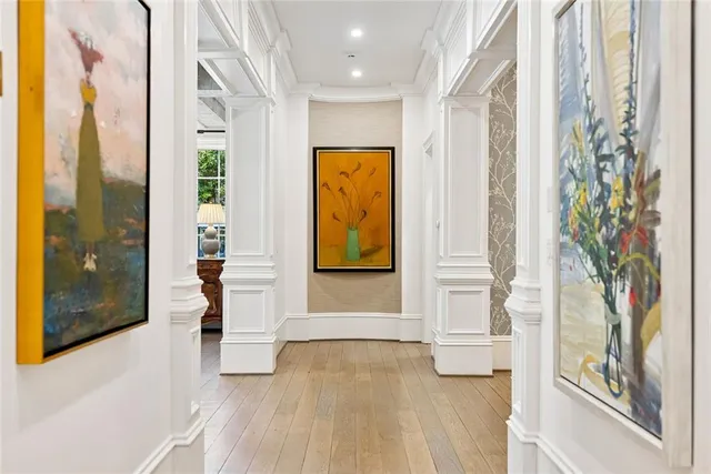 a bedroom with a bed and a television