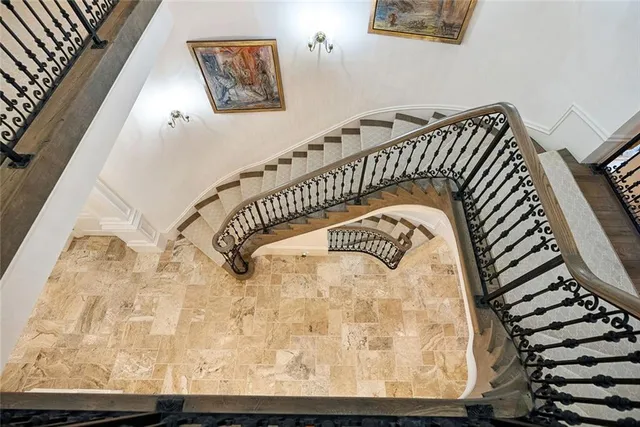 a view of a house with swimming pool and porch