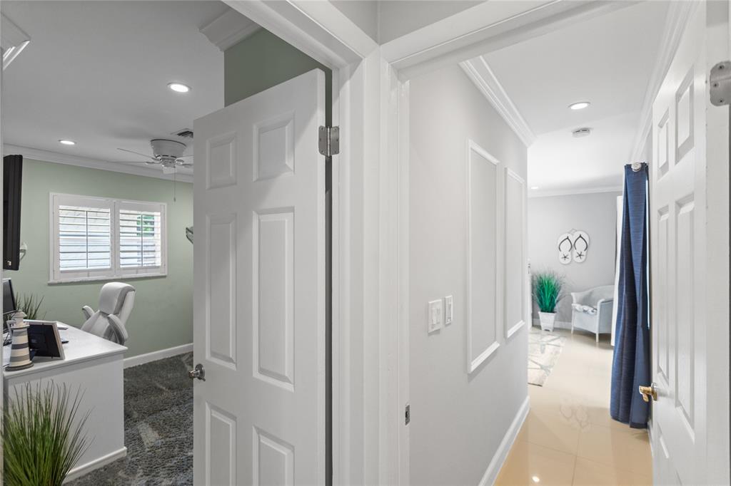 1650 Northeast 27th Avenue Pompano Beach, FL 33062 - Photo 41 of 90 a view of a hallway view with wooden floor and a living room