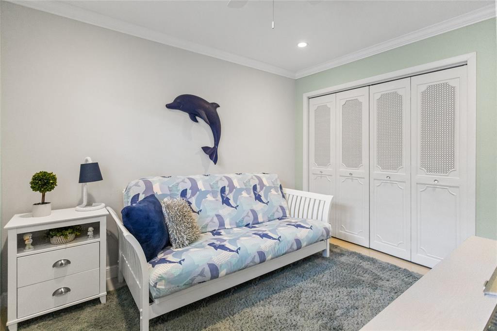 1650 Northeast 27th Avenue Pompano Beach, FL 33062 - Photo 44 of 90 a living room with furniture and a rug