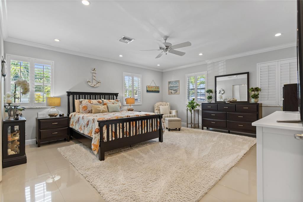 1650 Northeast 27th Avenue Pompano Beach, FL 33062 - Photo 45 of 90 a bedroom with a bed and window