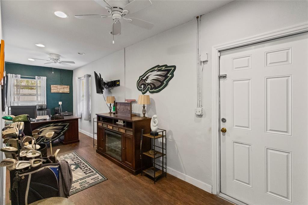 1650 Northeast 27th Avenue Pompano Beach, FL 33062 - Photo 52 of 90 a view of a workspace with furniture and a window