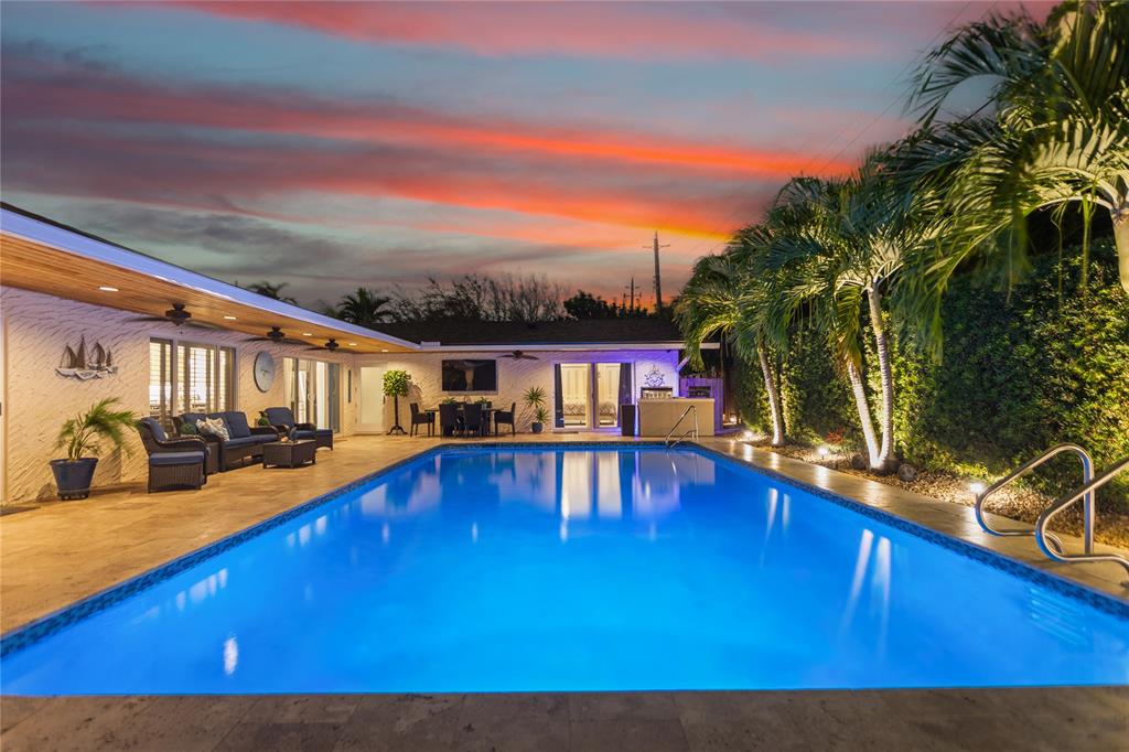 1650 Northeast 27th Avenue Pompano Beach, FL 33062 - Photo 62 of 90 a view of swimming pool with seating area and furniture