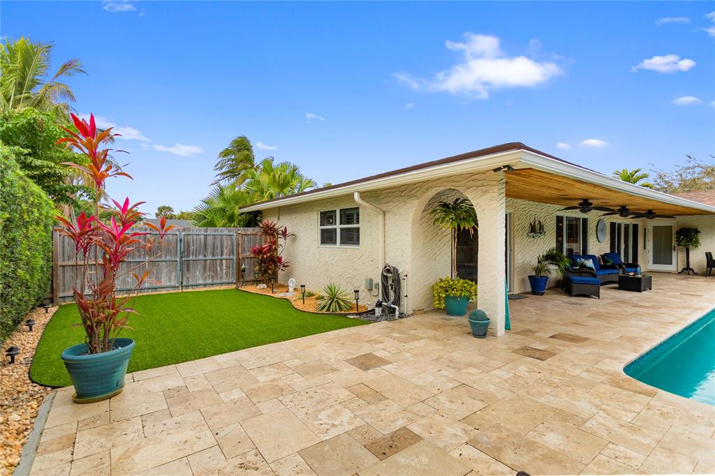 1650 Northeast 27th Avenue Pompano Beach, FL 33062 - Photo 68 of 90 a front view of a house having patio