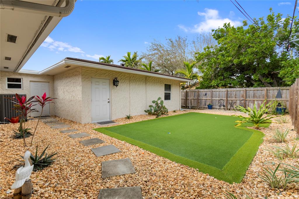1650 Northeast 27th Avenue Pompano Beach, FL 33062 - Photo 80 of 90 a view of a backyard with a patio