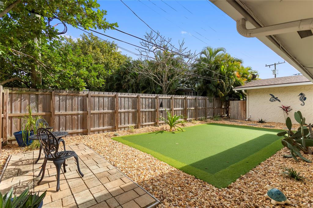 1650 Northeast 27th Avenue Pompano Beach, FL 33062 - Photo 81 of 90 a view of a backyard with swimming pool