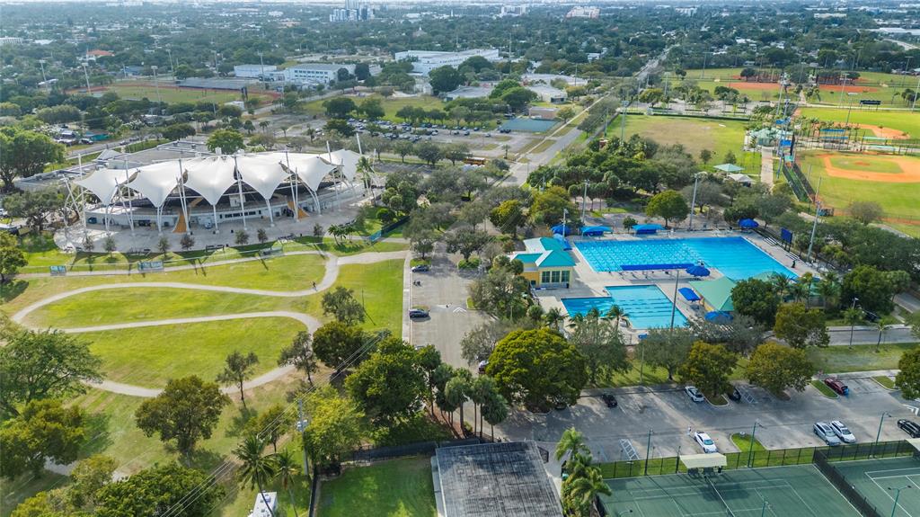 1650 Northeast 27th Avenue Pompano Beach, FL 33062 - Photo 82 of 90 an aerial view of residential houses with outdoor space and swimming pool