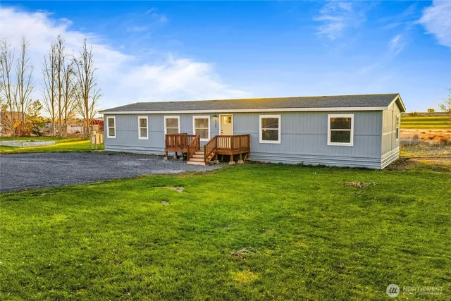 a house view with a garden space