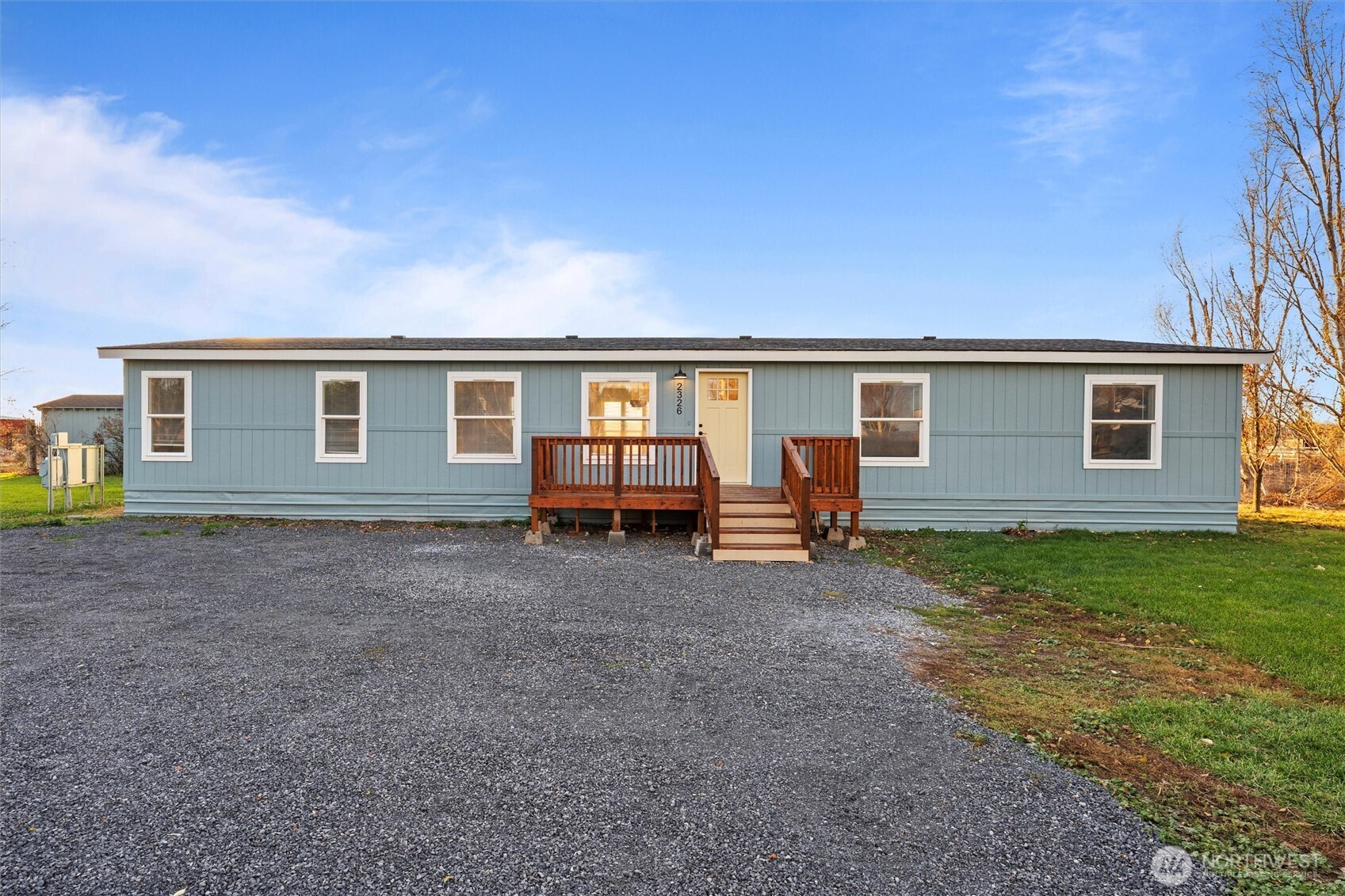 2326 Stoneridge Road Northeast Moses Lake, WA 98837 - Photo 2 of 37 a view of house with backyard