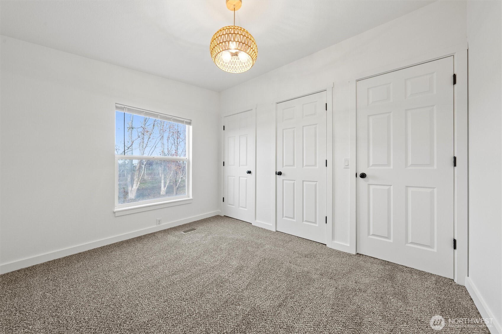 2326 Stoneridge Road Northeast Moses Lake, WA 98837 - Photo 23 of 37 a view of an empty room with a window