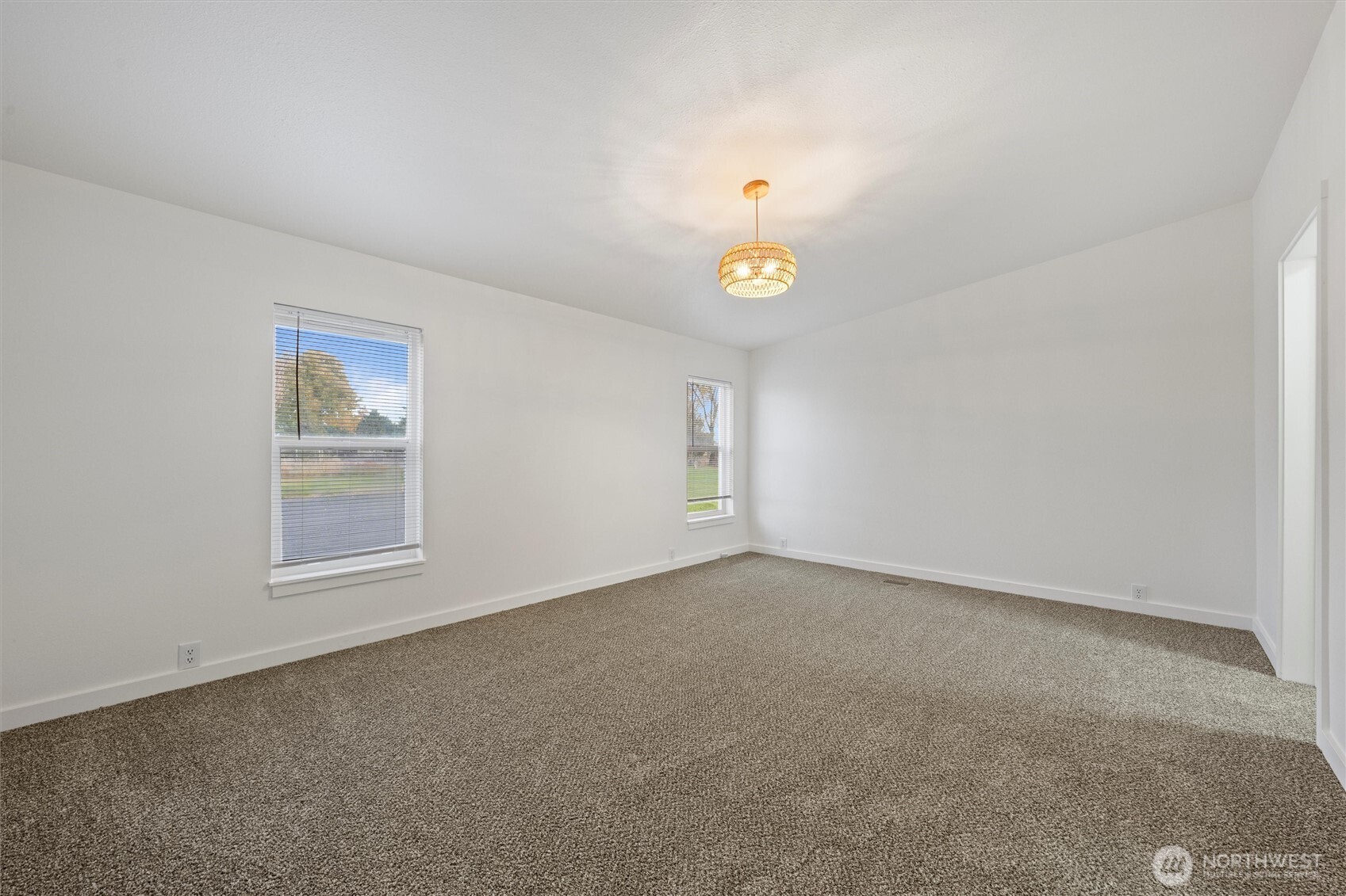 2326 Stoneridge Road Northeast Moses Lake, WA 98837 - Photo 30 of 37 an empty room with a window