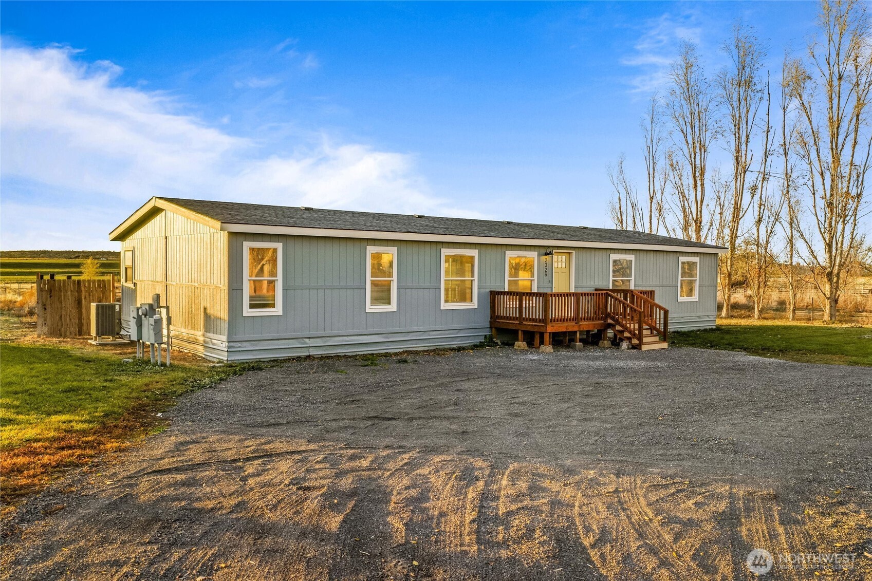 2326 Stoneridge Road Northeast Moses Lake, WA 98837 - Photo 3 of 37 a view of a house with backyard