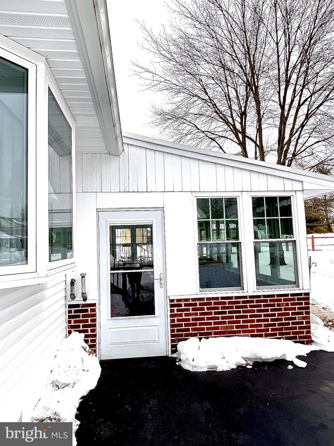 1907 Juniata Road Norristown, PA 19403 - Photo 8 of 12 Rear Enclosed Porch
