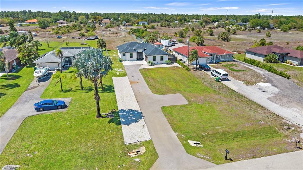 4571 22nd Street Northeast Naples, FL 34120 - Photo 2 of 47 Aerial perspective of suburban area