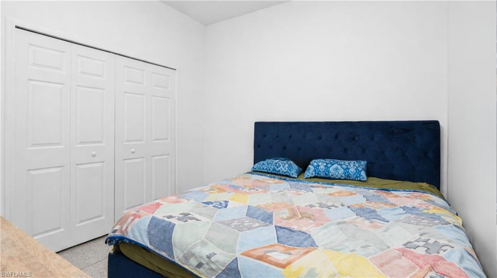 4571 22nd Street Northeast Naples, FL 34120 - Photo 23 of 47 Bedroom featuring a closet