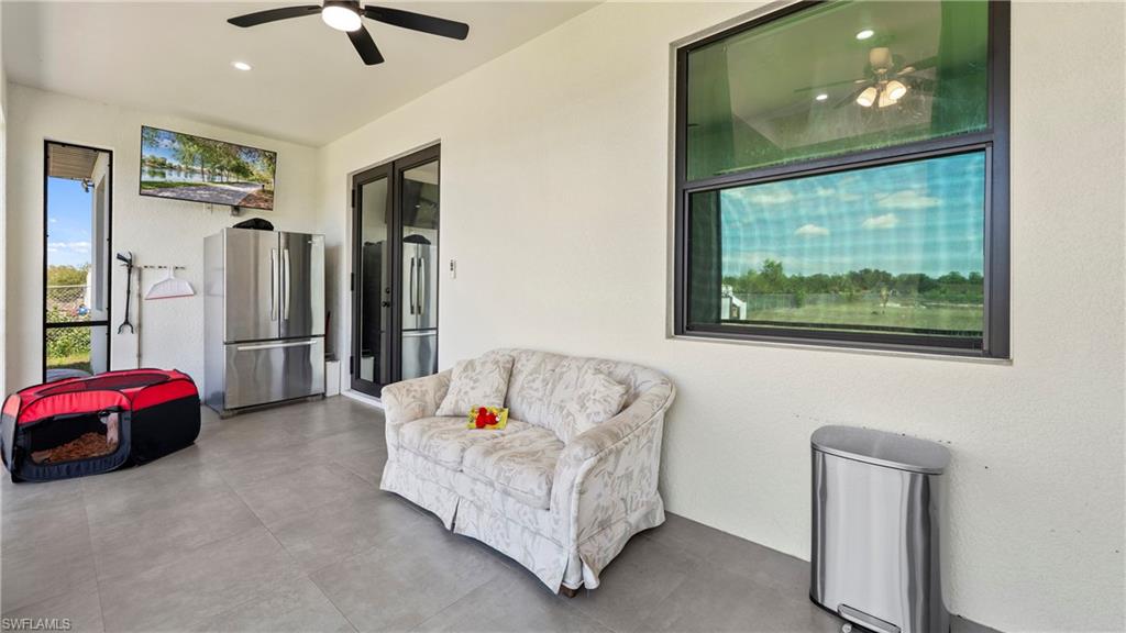 4571 22nd Street Northeast Naples, FL 34120 - Photo 35 of 47 View of patio featuring ceiling fan