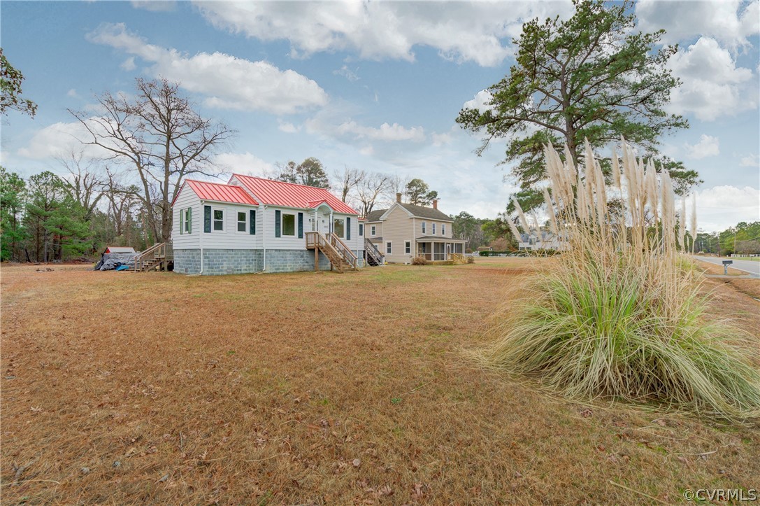 4462 Windmill Point Road White Stone, VA 22578 - Photo 23 of 48 a view of house with outdoor space and parking