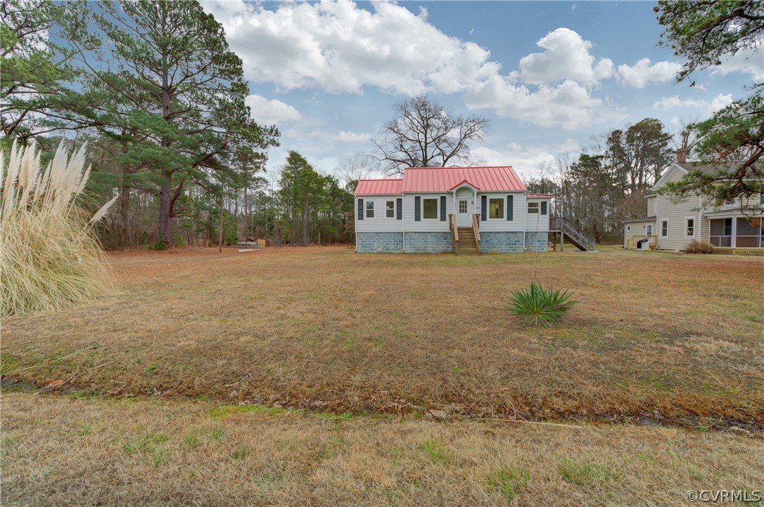 4462 Windmill Point Road White Stone, VA 22578 - Photo 31 of 48 a view of a house with a yard
