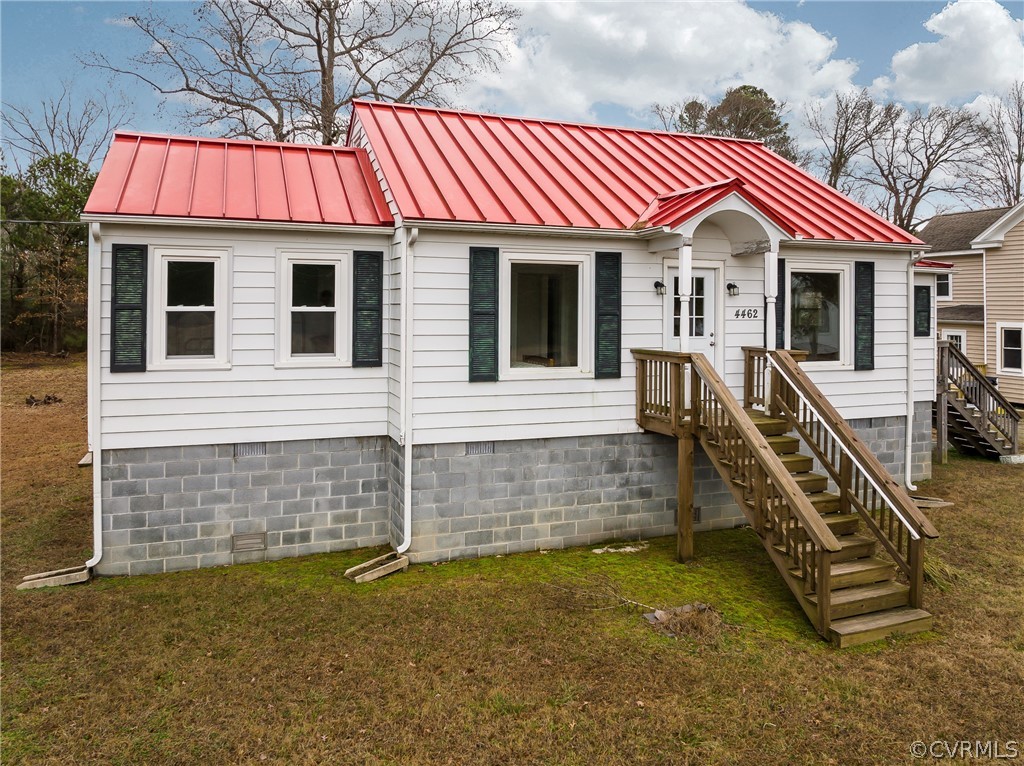 4462 Windmill Point Road White Stone, VA 22578 - Photo 41 of 48 a front view of a house with a yard