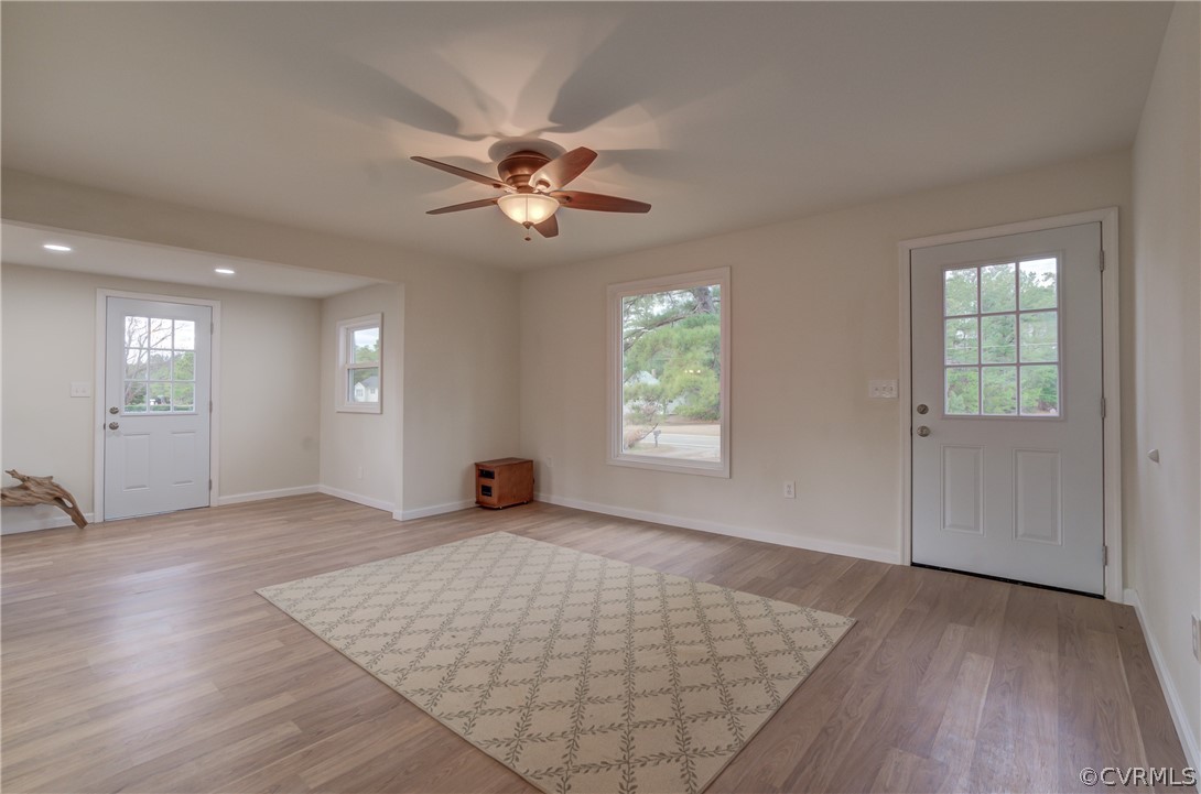 4462 Windmill Point Road White Stone, VA 22578 - Photo 6 of 48 an empty room with windows and closet