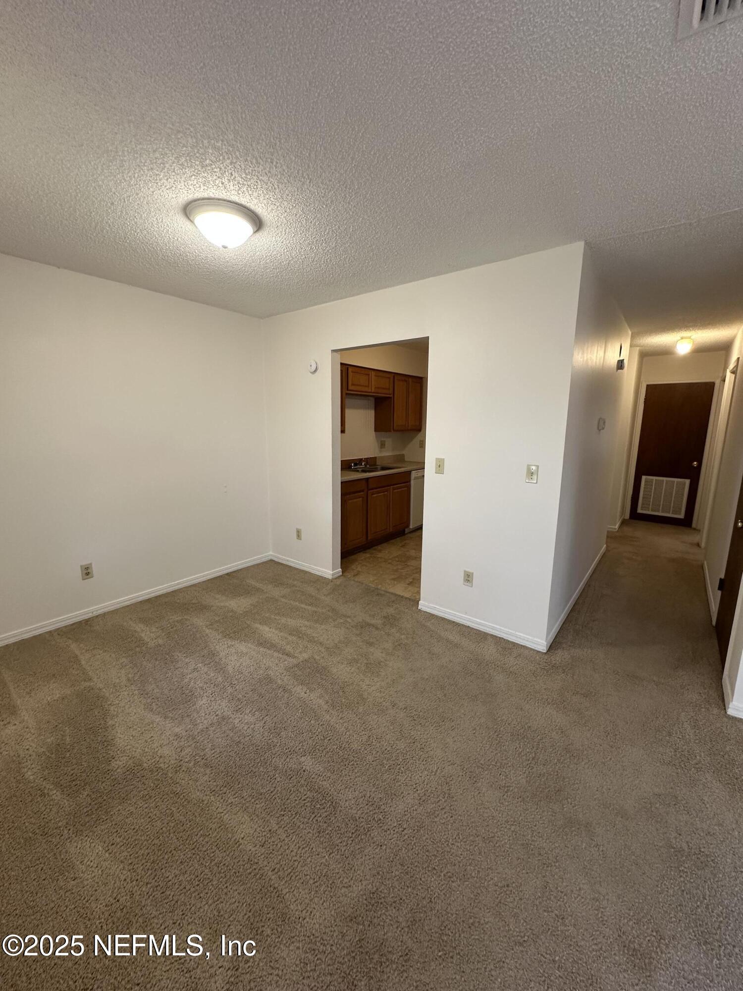 2934 Shelby Drive Orange Park, FL 32073 - Photo 2 of 6 a view of a livingroom with an empty space