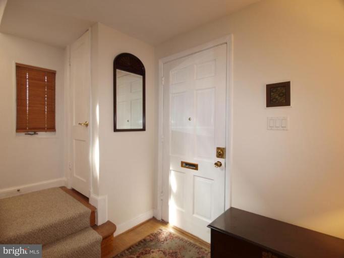 2600 Dawson Avenue Silver Spring, MD 20902 - Photo 2 of 24 a bedroom with a bed and a window